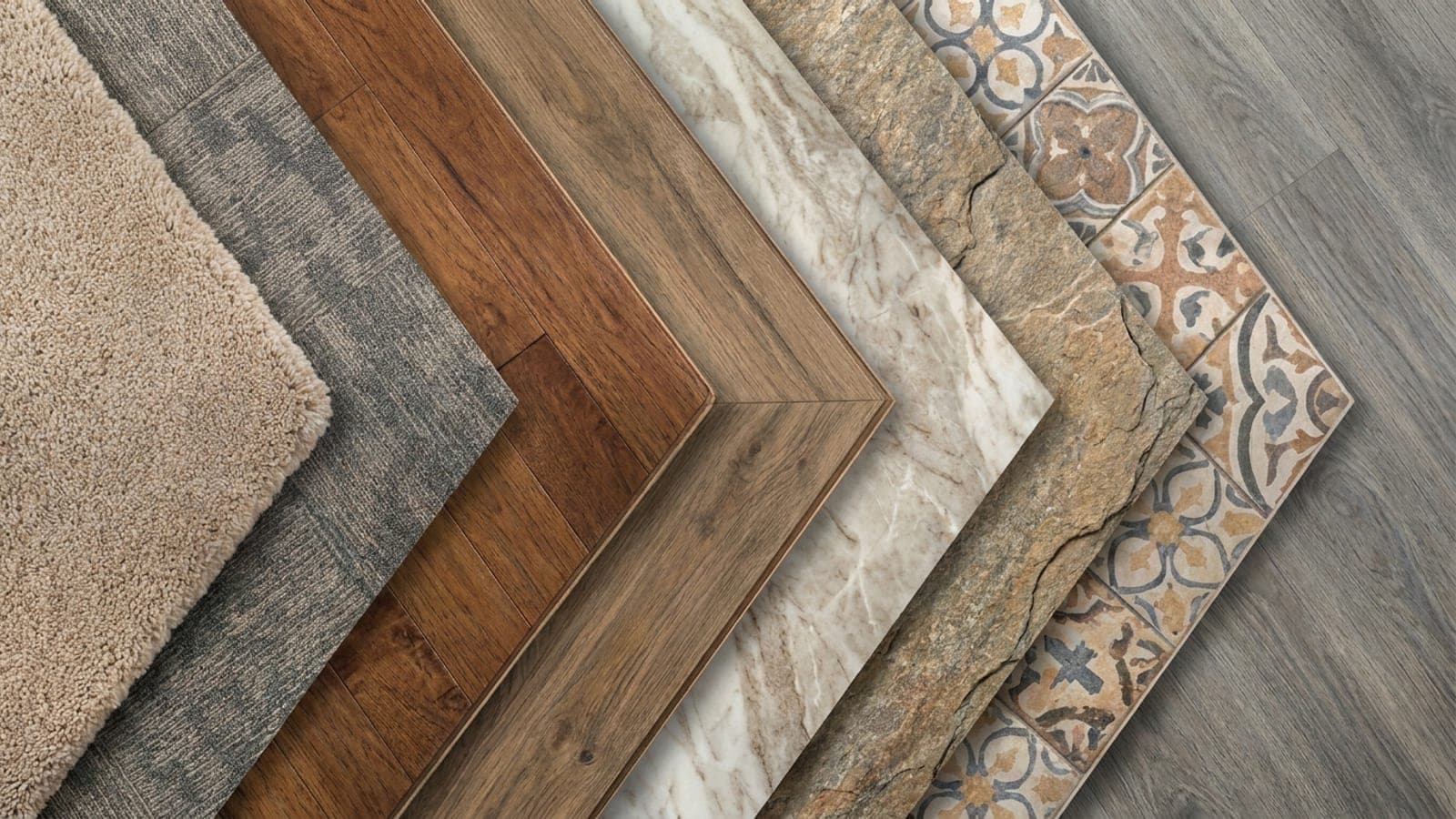 Carpet, hardwood, marble, natural stone and tile samples fanned out